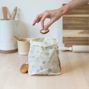 Protect charcuteries, savor tomatoes, and cherish crisp lettuce with ease. It's a cinch with the Medium Rectangle. Beeswax food wrap. Made from organic cotton.