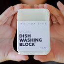 A vegan zero-waste vegan dish block® dish washing soap to cuts stubborn grime and grease, take stains out of laundry, wipe down counters. 215 GR