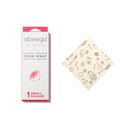 one small square beeswax foodwrap, made with beeswax, tree resin, and organic jojoba oil infused into a hemp and organic cotton cloth.