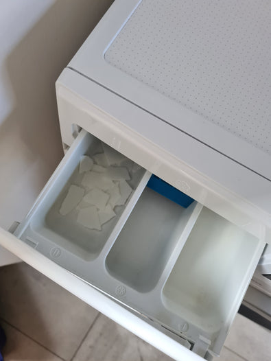 The first-ever ultra-concentrated softener strips for washing machines. Eco-friendly, plastic-free, and mess-free, they soften clothes, reduce wrinkles, and work in all washers. Ditch bulky jugs—shop eco-friendly products! - step 2 tear strips into dispenser container