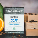 Men's bay rum Organic soap bar with sweet orange, allspice and clove essential oils. Hemp seed oil balances oil production, chicory root and elderberries calm irritated skin.