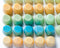 Lineup of different colours shampoo and conditioner bars