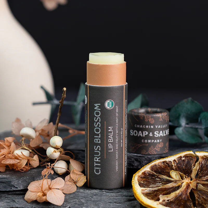 A touch of sunshine in a lip balm. Orange, lime, and grapefruit essential oils are blended in a nourishing base of organic plant oils and butters for a vibrant silky balm that glides on easily to moisturize and soothe sensitive lips.