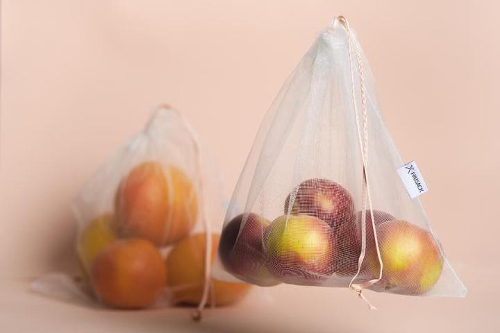 2 reusable but also COMPOSTABLE produce bag to carry your fruits and vegetables directly from the shop to your fridge. Peach trim version.