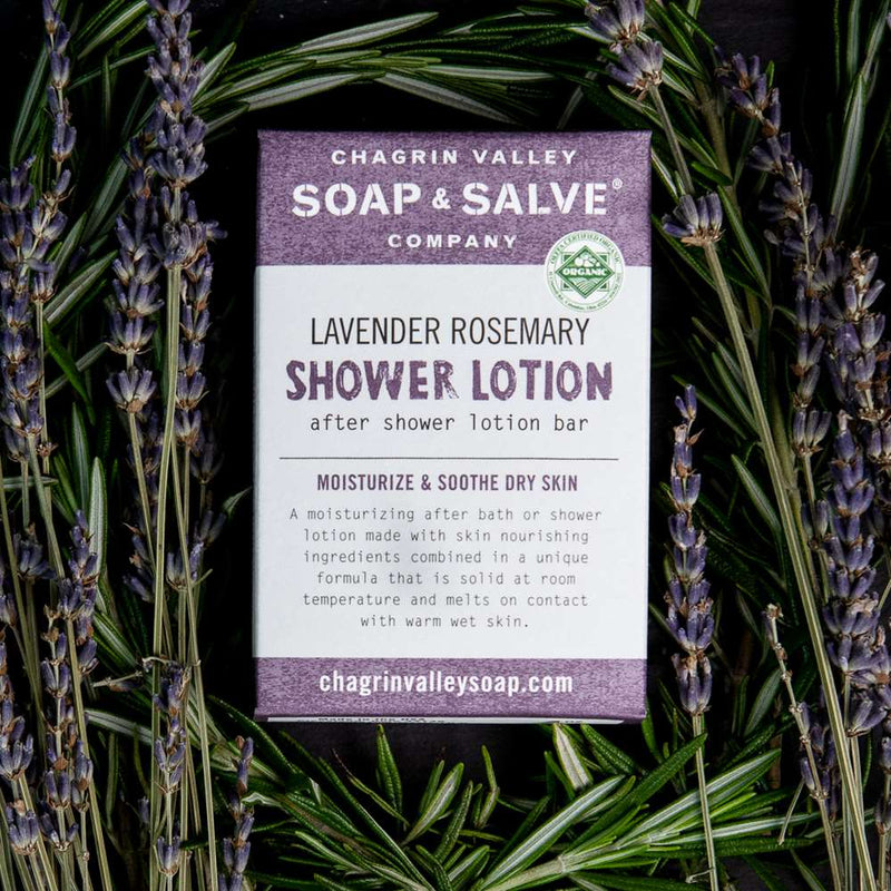 Lavender and Rosemary organic solid shower lotion bar, made with unrefined shea and cocoa butters. Melts on contact with warm wet skin and has excellent skin softening properties. Infused with a relaxing scent of lavender and light floral notes.